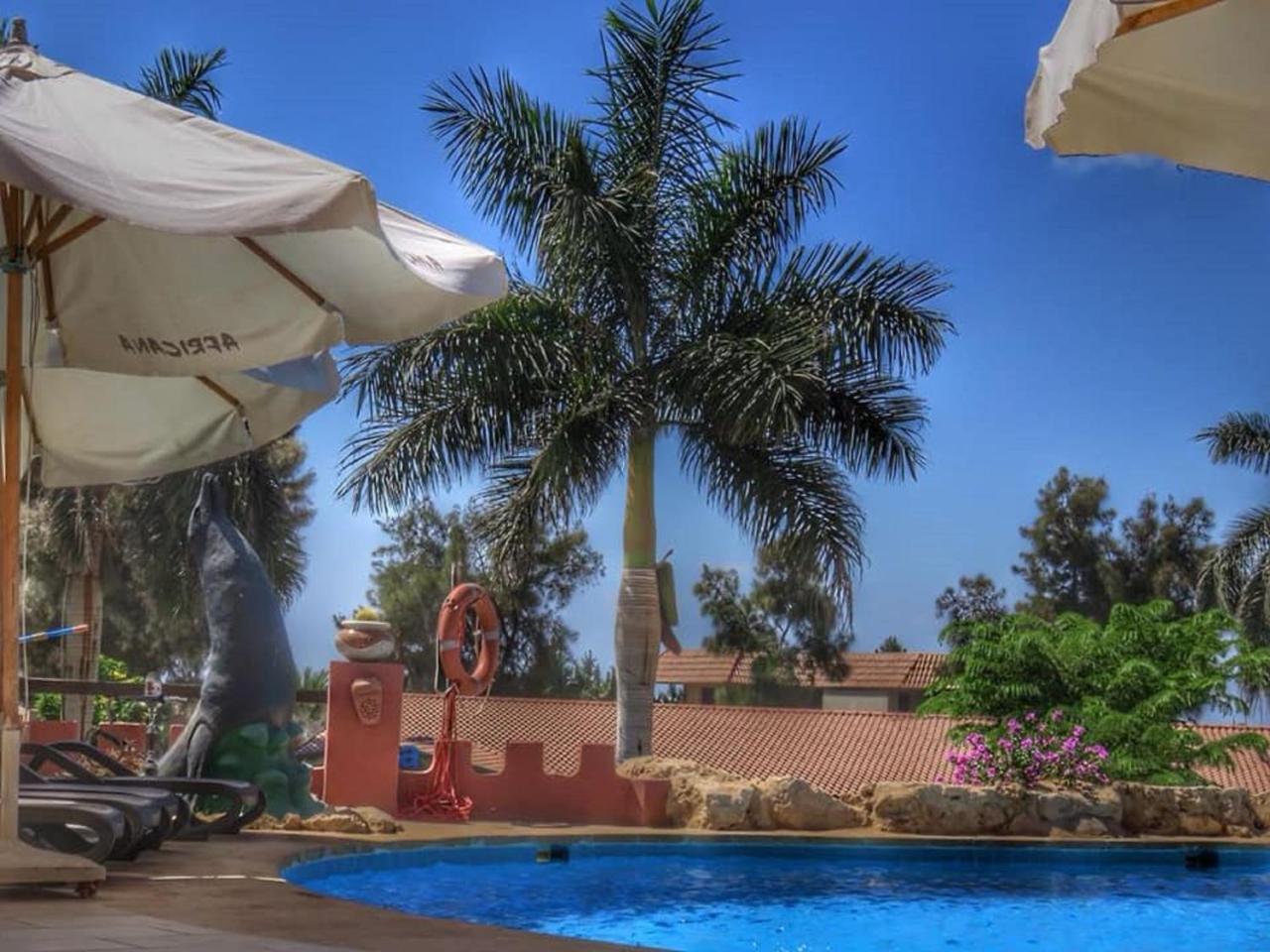 Africana Hotel & Spa Qaryat Shākūsh エクステリア 写真